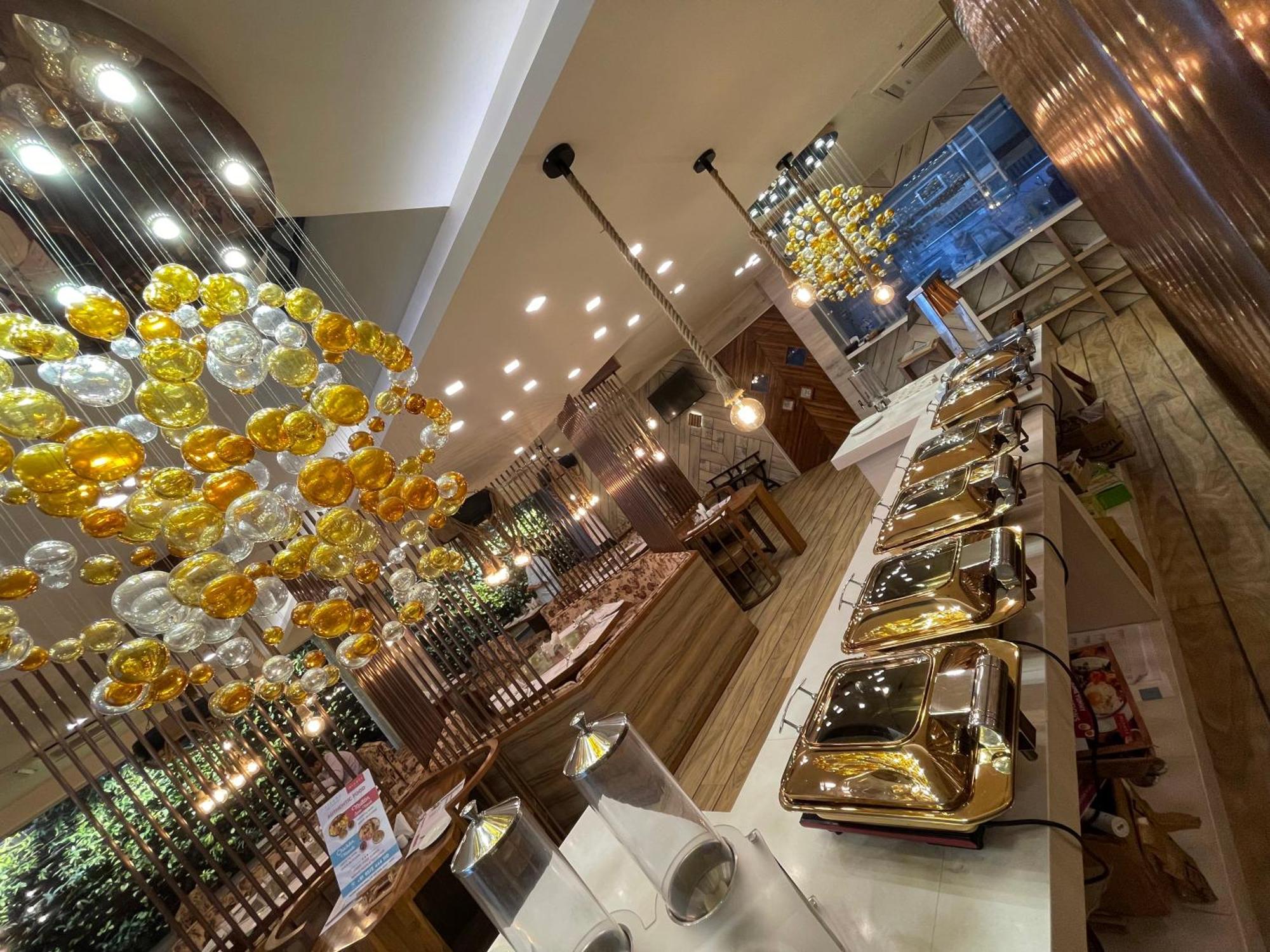 De Glance Hotel สุรัต ภายนอก รูปภาพ